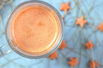 Vegan carrot juice with food decoration