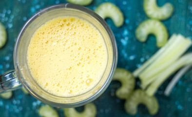 fresh apple and celery juice with food decoration