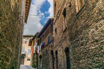 Small medieval streets of San Gimignano in Tuscany  - 12