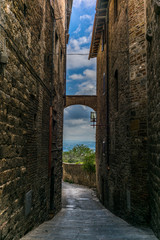 Small medieval streets of San Gimignano in Tuscany  - 11