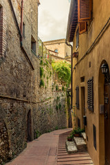 Small medieval streets of San Gimignano in Tuscany  - 4
