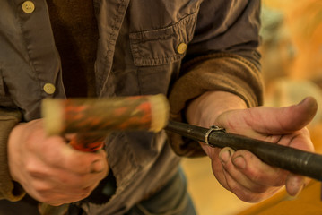Artisan making a silver ring - 1