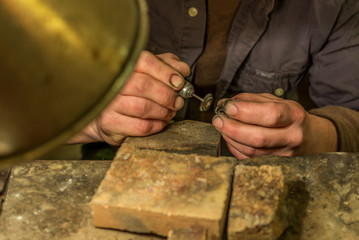 Artisan making a silver ring - 4