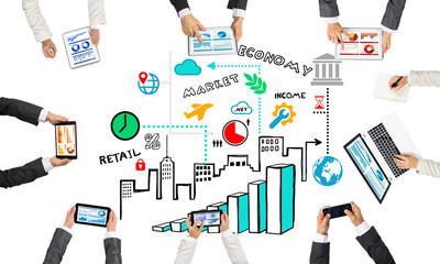 Top view of businesspeople sitting at table and using gadgets