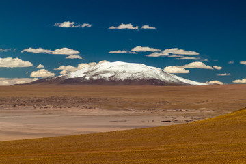 Snow covered peak at bolivian Altiplano