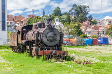 Old steam train engine near Estacion Presidente Arce, old railway station in Sucre, Bolivia