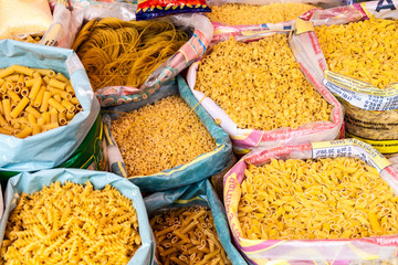 EL ALTO, BOLIVIA - APRIL 23, 2015: Different sorts of pasta at a market in El Alto, Bolivia