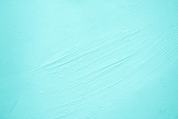 concrete wall of light blue color, texture turquoise cement background