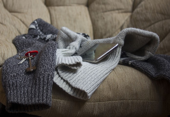 Fototapeta na wymiar warm clothes , a sweater on the chair