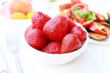 Breakfast - fresh strawberries on table