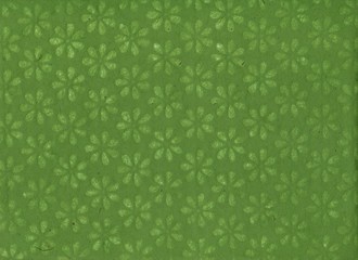 Hand made paper background with plant textures and silhouettes. Old dirty paper background. Hand made flower paper sheet.