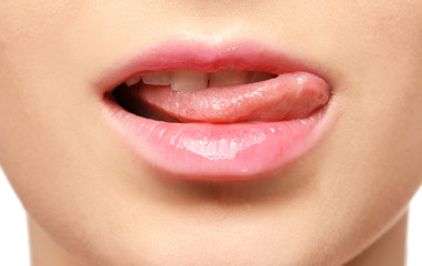 Naklejka premium Lips of beautiful young woman, closeup