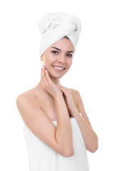 Beautiful young woman after shower on white background