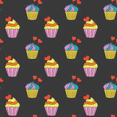 Seamless pattern with cupcakes on the black background.