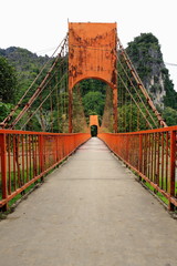 Toll suspension footbridge over Nam Song river-Vang Vieng-Vientiane province-Laos. 4662