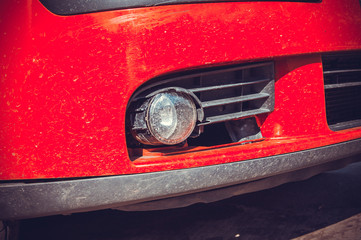 Broken plastic grille on the car