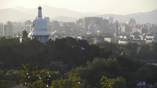panoramic view of BeiJing BeiHai Park White Tower & metropolis high rise buildings urban.