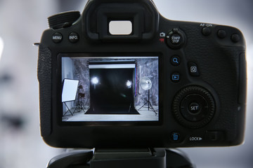 Empty photo studio interior on camera display
