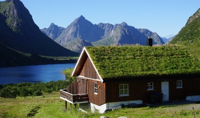 Traditional Norwegian house with a sod roof covered with turf grass