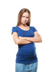 Fototapeta premium Emotional pregnant woman on white background