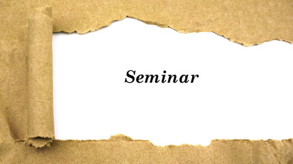 Torn paper with word "seminar"
