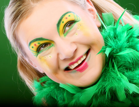 crazy woman over green background