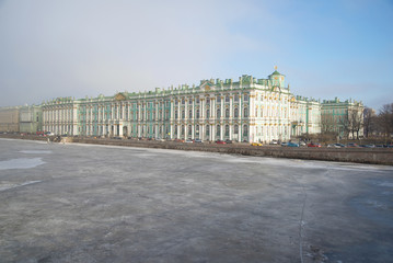 Naklejka premium A view of the Frozen Neva and the Winter Palace in the March afternoon. Saint-Petersburg