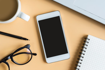 Laptop, notebook, smart phone with cup of coffee and copy space