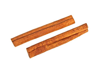 Cinnamon sticks on a white background, top view