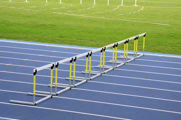 Hurdles on empty running track