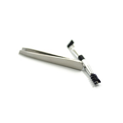 Cosmetic set : spoolie brush, tweezers, angled brush isolate on white background