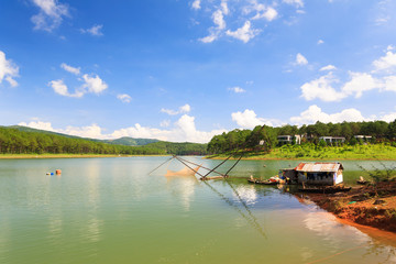 Fishing net in Tuyen Lam lake in Dalat, Lam Dong, Vietnam. Tuyen Lam lake is artificial lake, 6km to the South of Dalat, has the water surface of 350 hectare.
