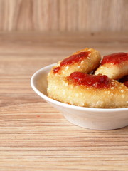 Chicken nuggets with sesame seeds on a plate