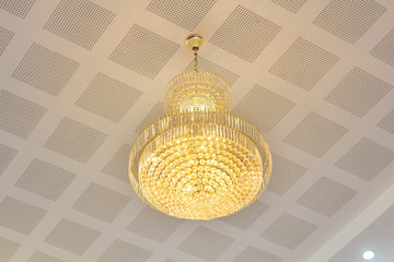 Crystal lighting fixture illuminating on ceiling