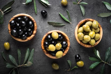 Gordijnen Black and green olives. Top view. © nadianb