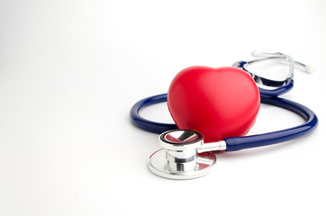 red heart and a stethoscope on white background, health care medical technology concept, soft focus, selective focus.