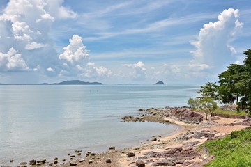 The sky is wide, the white clouds are beautiful over the sea and Sand beach in summer of thailand