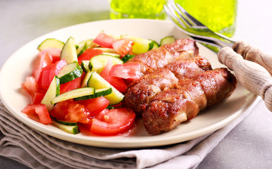 Roasted beef sausages and salad