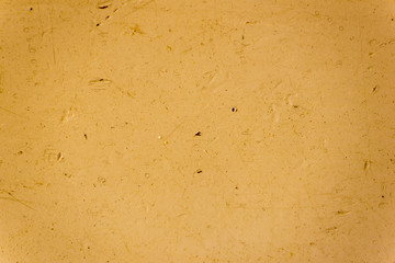 A background of a table of an orange color