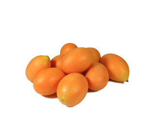 Heap of Vibrant Orange Yellow Fresh Ripe Marian Plum or Ma-Prang Fruits Isolated on White Background, with Free Space for Text and Design 