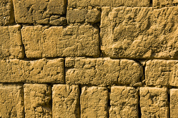 Mud brick wall background and texture 