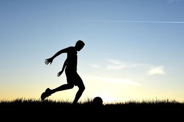 Obraz na płótnie Canvas Man playing a football