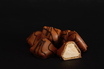 Chocolate candy on a black background