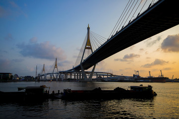 Fototapeta na wymiar River Bhumibol Bridge (The Industrial Ring Road Bridge) in the evening , Thailand.
