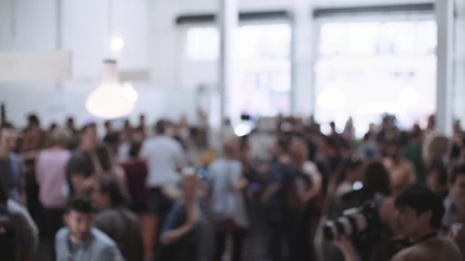 Incredible enormous open space full of light full of people on a weekend event festival food market or start up company gathering