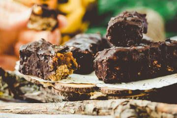 Homemade chocolate candy snickers bars. Vegan dessert. Tone.