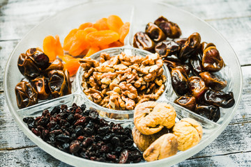 Mix of dried fruits and nuts, health food concep.