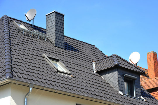 Ziegeldach mit modernisierten Dachgauben