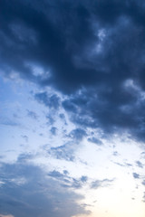Beautiful clouds at sunset after rain as background .