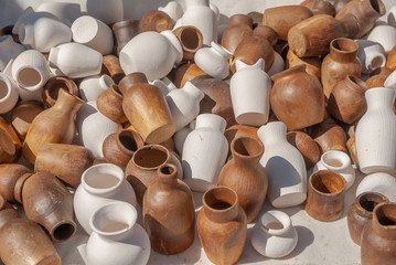 decorative jugs made of wood, background texture